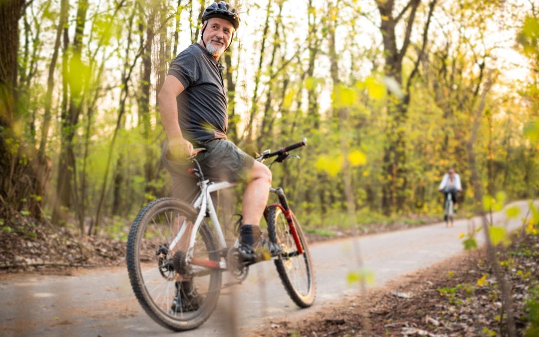 man cycling on mountain bike